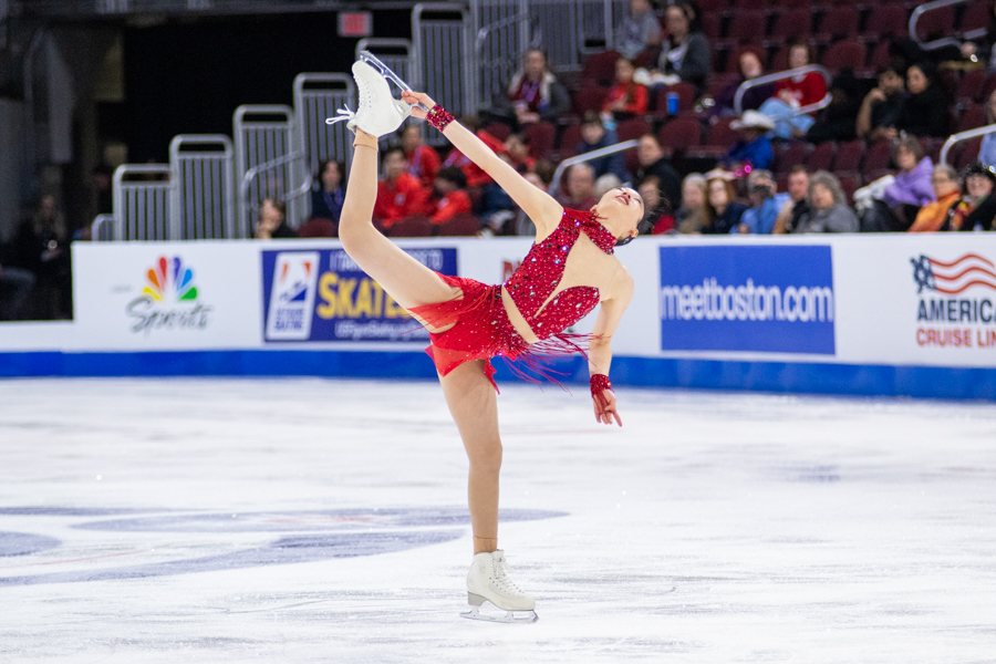 Josephine Lee performs a catch-foot camel spin during the Championship Women / Short Program competition on Jan. 23. Lee finished in 10th place with a score of 60.10.