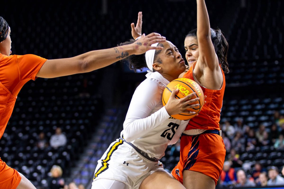 Salese Blow runs into a UTSA defender during the second half on Feb. 8. Blow scored 15 points in the loss to the Roadrunners.