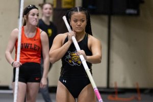 Freshman Abby Rexford prepares herself for her first jump at the Coach Wilson Invitational on Jan. 31. The meet took place in the Heskett Center gymnasium, from Jan. 30 to Feb. 21.