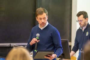 Chase Billingham, an at-large faculty senator at Wichita State, speaks  at a Faculty Senate meeting on Feb. 10. Senators expressed their concern regarding the recently proposed Kansas House Bill No. 2348.