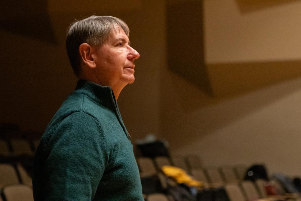 Music professor Tom Wine leads the Shocker Choir in rehearsal for their upcoming concert. Wine will retire from Wichita State University and higher education this spring.