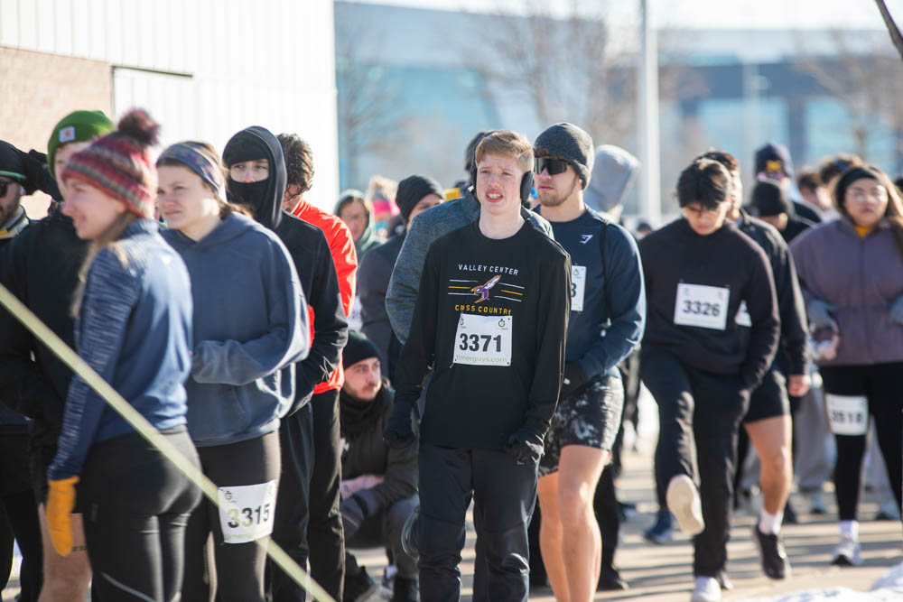 More than 100 students, faculty, staff and community members wait for the start of the annual Wichita State Engineering 5K Run/Walk. The temperature around the start of the race was 13 degrees Fahrenheit.