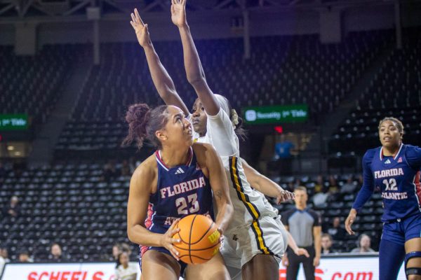 Senior foward Ornella Niankan defends against a Florida Atlantic shot in the paint on Feb. 5. Niankan contributed two blocks and shot 50% from the free throw line in the WSU win.