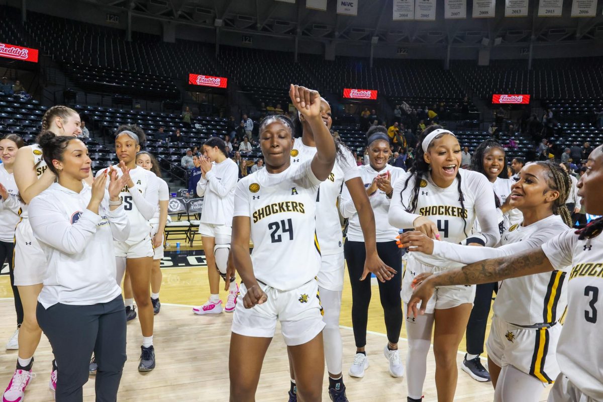 Junior forward Maimouna Sissoko dances at the conclusion of the game against Rice University. Sissoko finished with one point and one rebound in the win against the Owls.