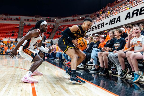 Senior Xavier Bell tries not to step out of bounds on March 18. Bell scored a game-high 24 points on 41% shooting against OSU.