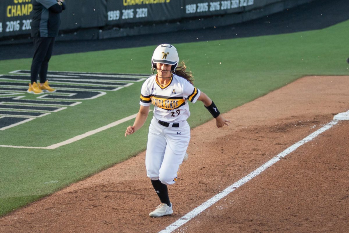 Junior Taylor Sedlacek runs for home plate on a home run on March 28.