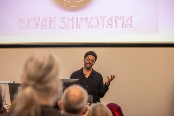 Devan Shimoyama, award-winning contemporary multidisciplinary artist, shares his experience and how he portrays it in his art. The artist talk took place in McKnight Art Center on Feb. 27.