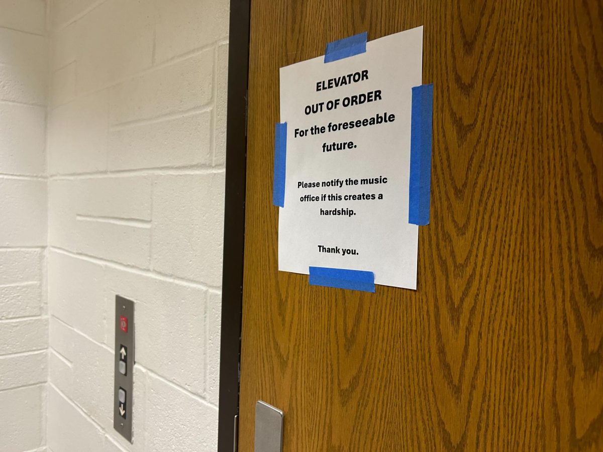 A sign informs visitors in the Duerksen Fine Arts Center that the elevator is closed. 