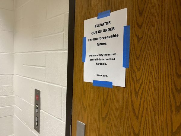 A sign informs visitors in the Duerksen Fine Arts Center that the elevator is closed. 