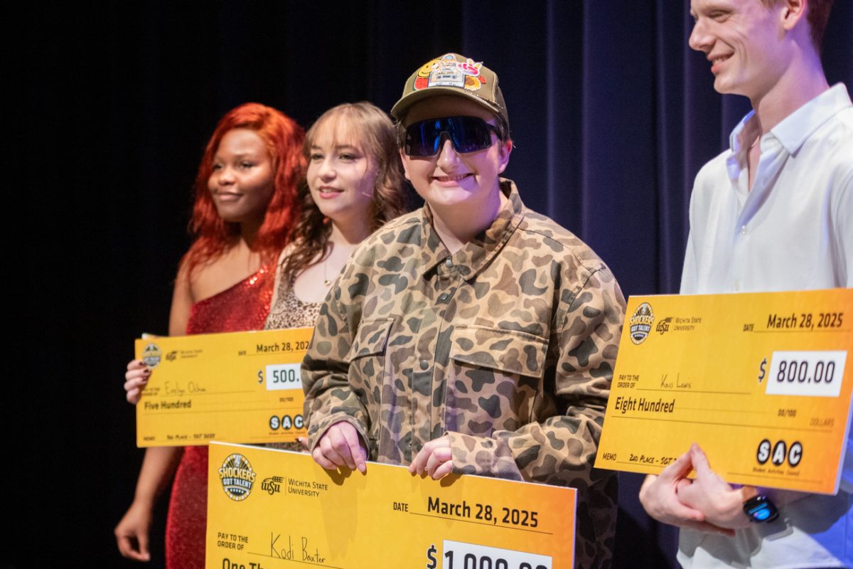 Kodi Baxter and other winners of Shockers Got Talent smile for photos after being awarded their prizes. Baxter won first place with her original house song, "I Never Could Let Anyone In." (File photo).