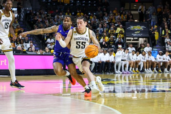 Senior guard Bijan Cortes drives against a defender on March 9. Cortes scored eight points in the loss on senior day.