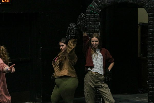 Pashence Adkins and Darby Parks pose as Evil Tina and Gabbi, the cheerleader succubi in the DND world. "She Kills Monsters" is in rehersals ahead of the opening May 1.