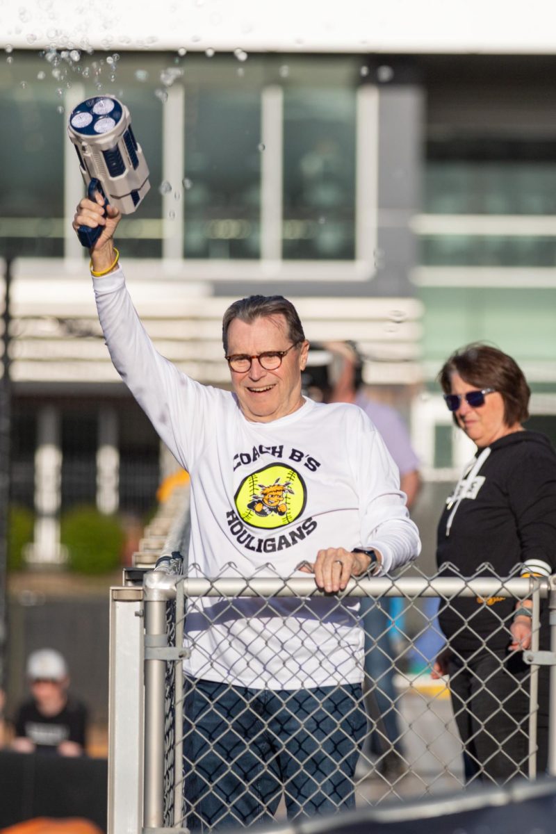 A Shocker fan uses a bubble gun following Wichita State's first home run against East Carolina on April 11.