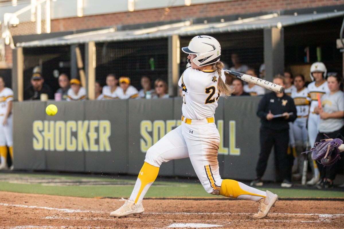 Senior Krystin Nelson hits the ball back toward East Carolina during the April 11 game. Nelson had one RBI during the game.