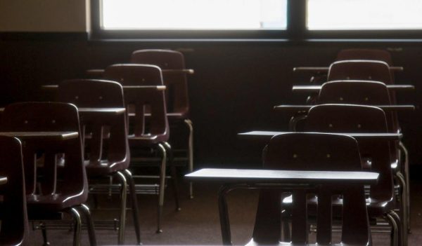 Empty desks in an Elliott Hall classroom on Monday, March 23, 2020 (File photo).