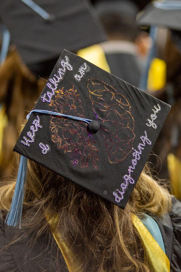 Students decorated their graduation caps for the 2025 spring commencement.