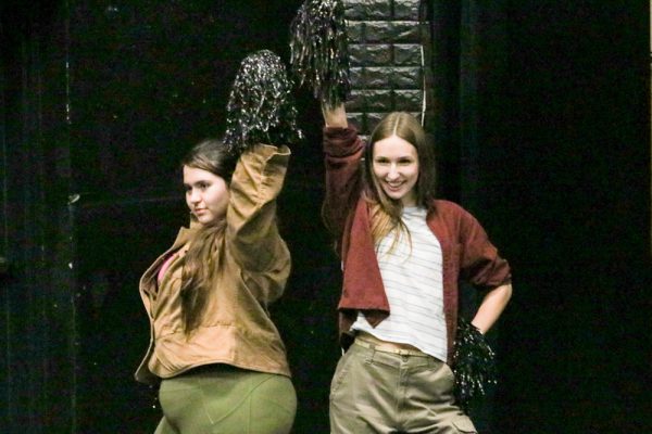 Pashence Adkins and Darby Parks pose as Evil Tina and Gabbi, the cheerleader succubi in the DND world. "She Kills Monsters" is in rehersals ahead of the opening May 1.