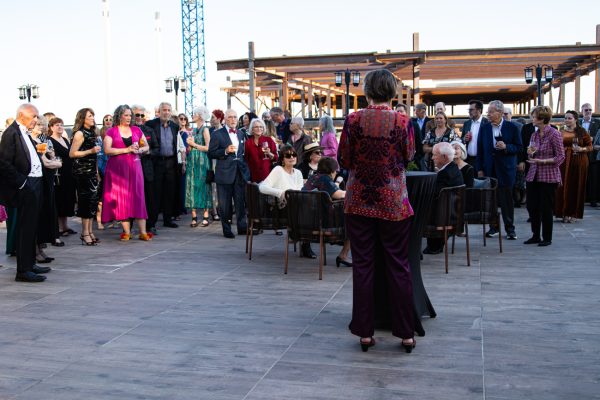 Guests gather to listen to opening remarks by Ulrich Advisory Board member Lee Starkel at the Ulrich50 Gala. The Ulrich Museum originally opened in 1974.