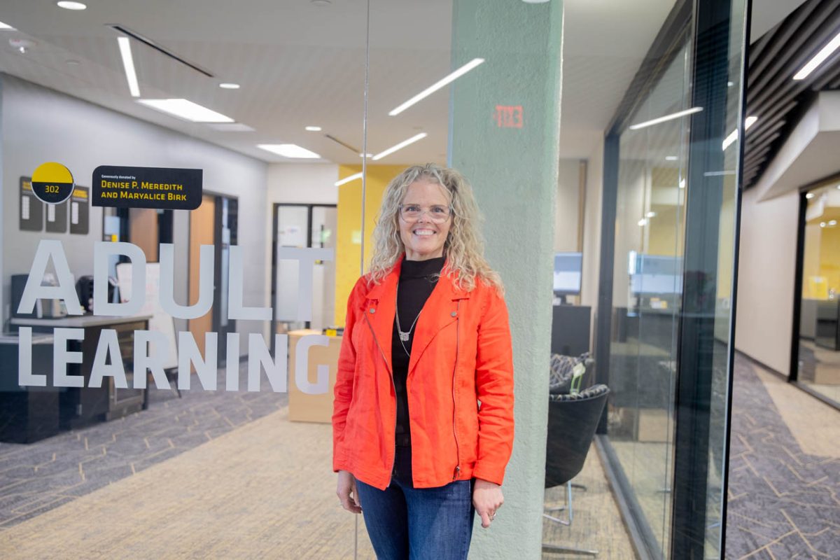 Social work student Robin Monroe poses for a photo outside the Online and Adult Learners office. Monroe said that OAL helped her throughout her time at WSU. 