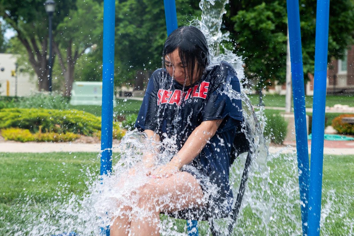 Thao Pham, a third year student studying business administration, is doused in water at the ASC fundraiser outside the RSC. Pham was dunked several times during the two hour event.