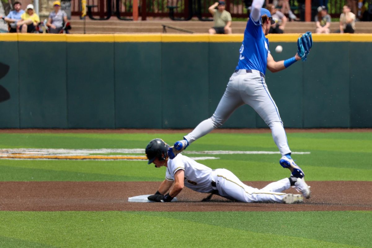 Sophomore Camden Johnson slides into second base against Memphis. Johnson stole a career-high three bases in the 3-1 win on May 17.