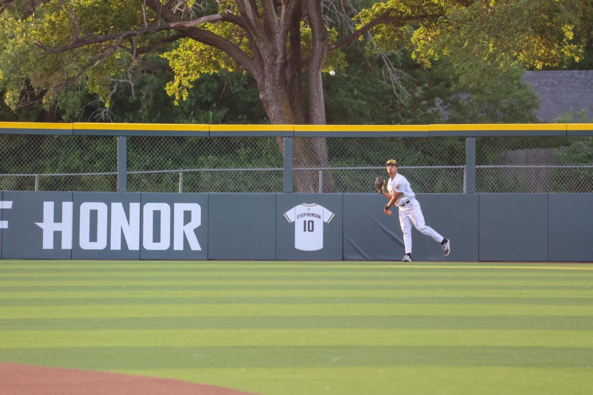 Junior Jaden Gustafson throws the ball from the outfield against Oral Roberts. Gustafson made three putouts in the 13-9 win on May 13.