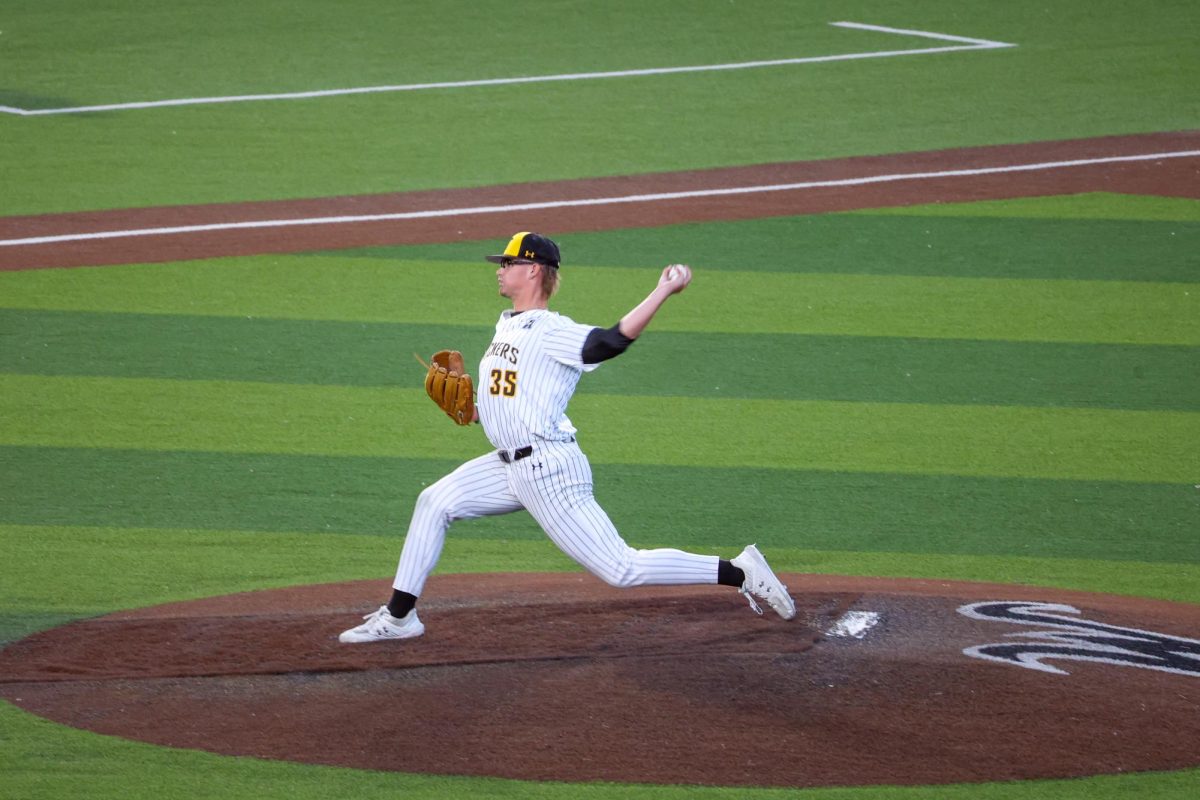 Sophomore Drew Iverson winds up to throw a pitch against Oral Roberts. Iverson pitched 1 1/3 innings on May 13 and struck out two batters.