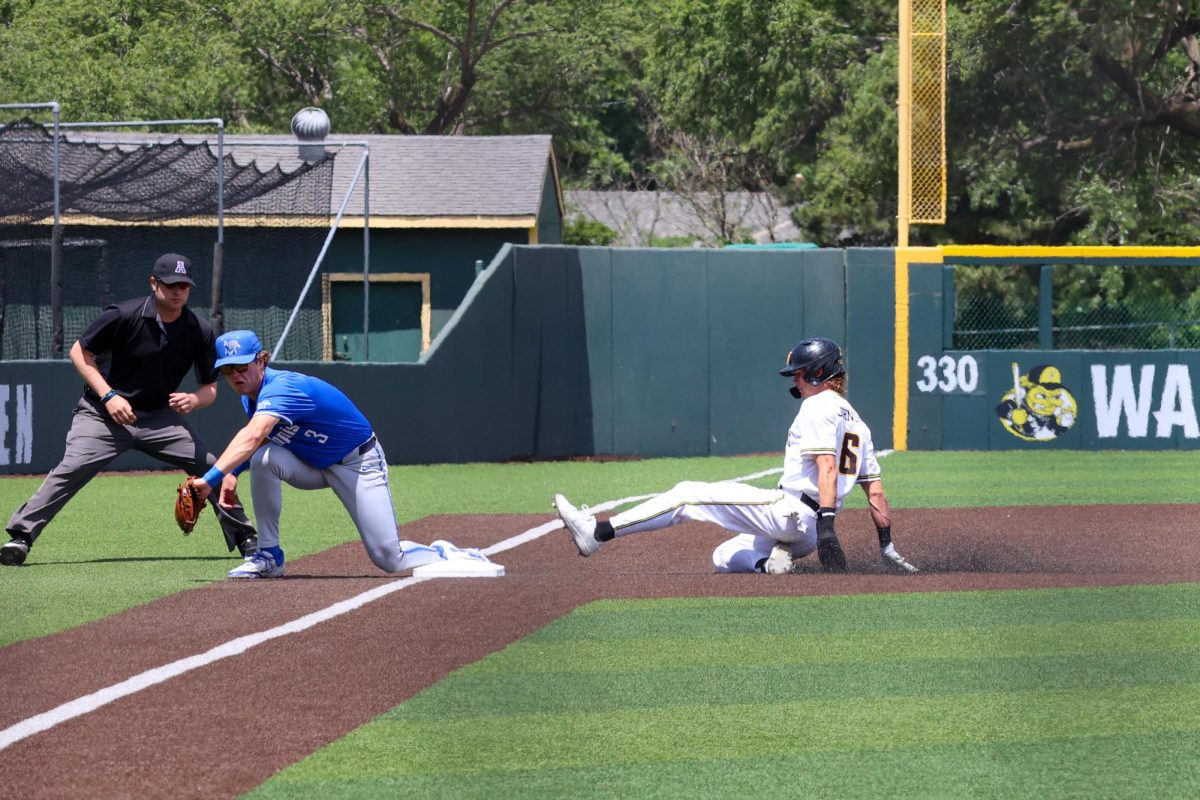 Sophomore Camden Johnson steals third base on May 17 against Memphis. Johnson's three steals in the 3-1 win brought this season total to nine.