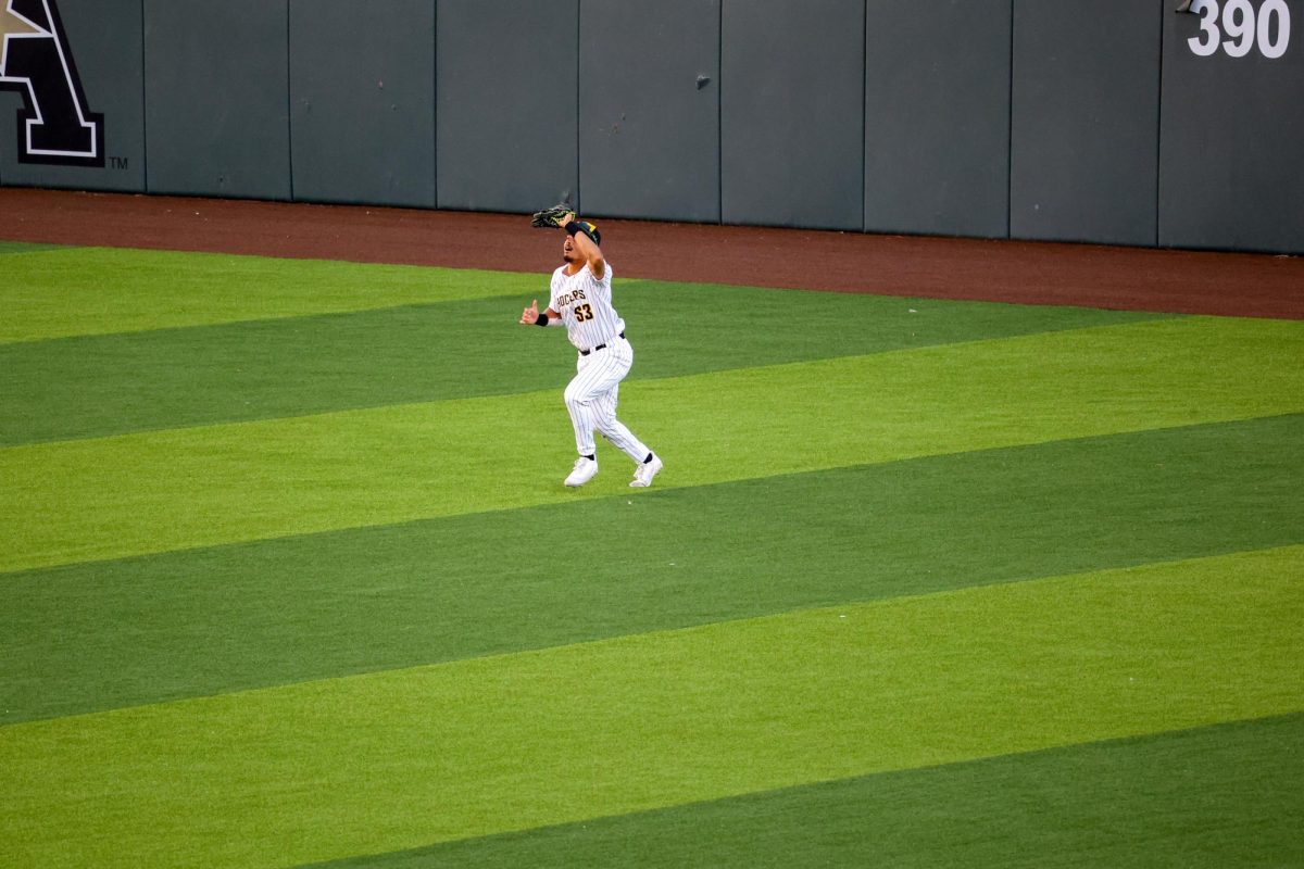 Sophomore Kaleb Duncan tracks down a fly ball in the outfield against Oral Roberts. Duncan had two putouts in the 13-9 win on May 13.