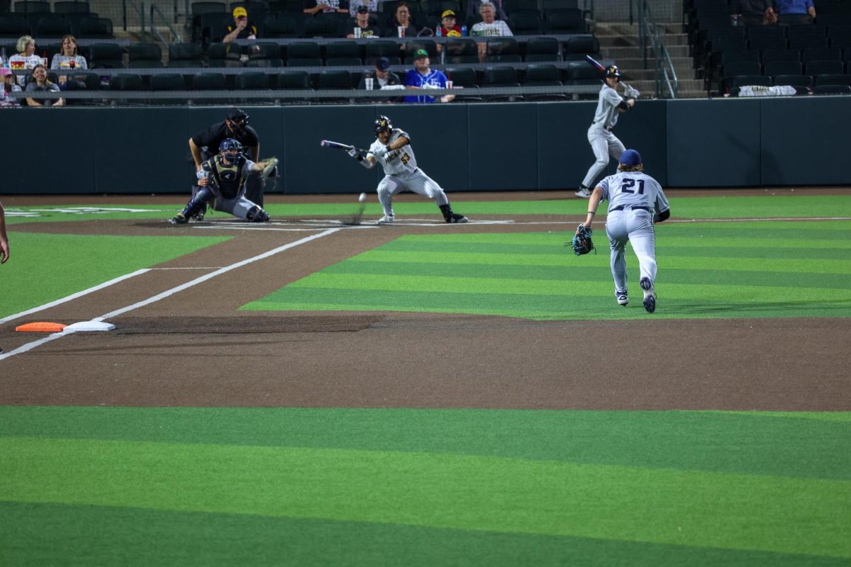 Sophomore Kaleb Duncan lays down a bunt on May 13. Duncan hit 2-5 with two RBI against Oral Roberts.