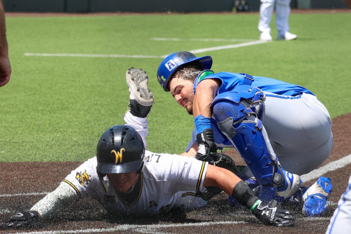 Senior Josh Livingston gets tagged out at home while trying to score on May 17. Livingston was gunned down by the Memphis left fielder.