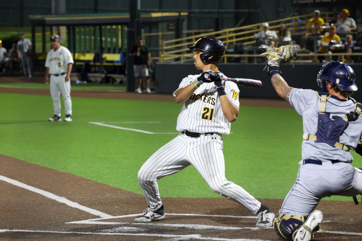 Junior Jaden Gustafson leans back after a pitch almost hits him on May 13. Gustafson had a career-high six RBI in the 13-9 win over Oral Roberts.