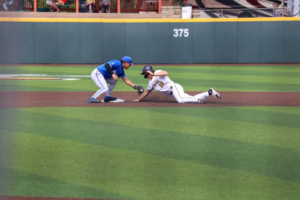 Sophomore Kam Durnin slides to steal second base on May 17. The Shockers stole a season-high five bases in the 3-1 win against Memphis.
