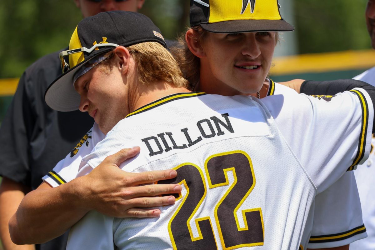 Senior Cole Dillon hugs sophomore Gannon Snyder during WSU's senior day celebration on May 17. Dillon has played in 34 games this season since transferring from Arizona.