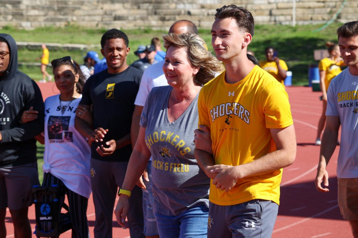 Senior sprinter RJ Hutchison walks out during the senior day celebration at the Shocker Open on May 9. Hutchison has been named All-American Athletic Conference five times for indoor and outdoor events.