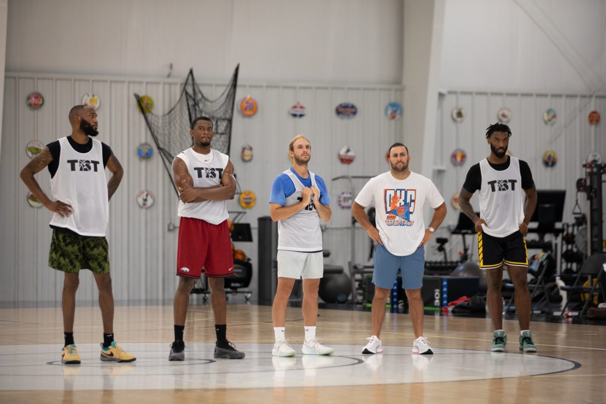 Former Wichita State and current AfterShocks players line up at half-court to watch the rest of their team practice on July 15. The TBT is a 64-team tournament with a grand prize of $1 million.