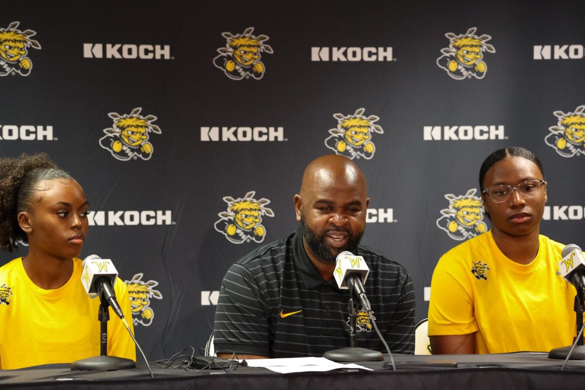 Guard Jaila Harding (left), head coach Terry Nooner (middle) and forward Bre'Yon White (right) answer questions at a press conference on July 16. Wichita State's women's basketball team signed 11 new players this offseason.