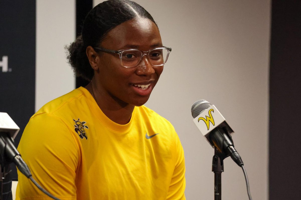 Senior forward Bre'Yon White answers questions at a press conference on July 16. White is one of only four returners from last year's WSU women's basketball team.