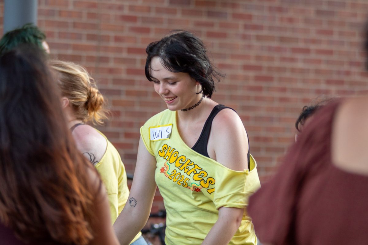 Organizers of Shockerfest check in students for Shocker Island on Aug 15. The event was hosted by the first year programs at Wichita State.