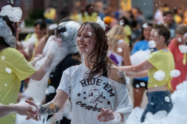 Students after a the foam machine was brought out at the Shocker Island event on Aug 15. The event was part of WSU's first year programs.