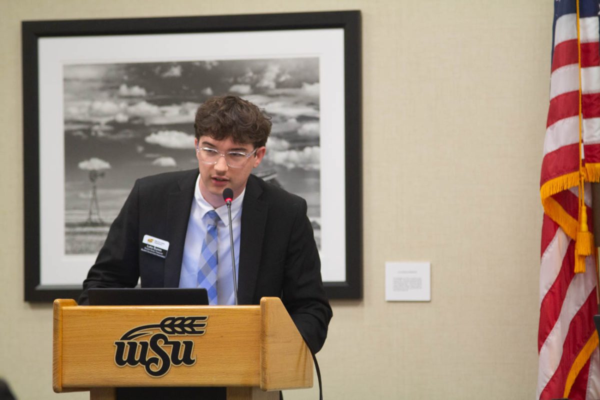Student Body Treasurer Luke Bumm presents the 86 bills suggesting appropriations budget. All the bills were voted on the same night.