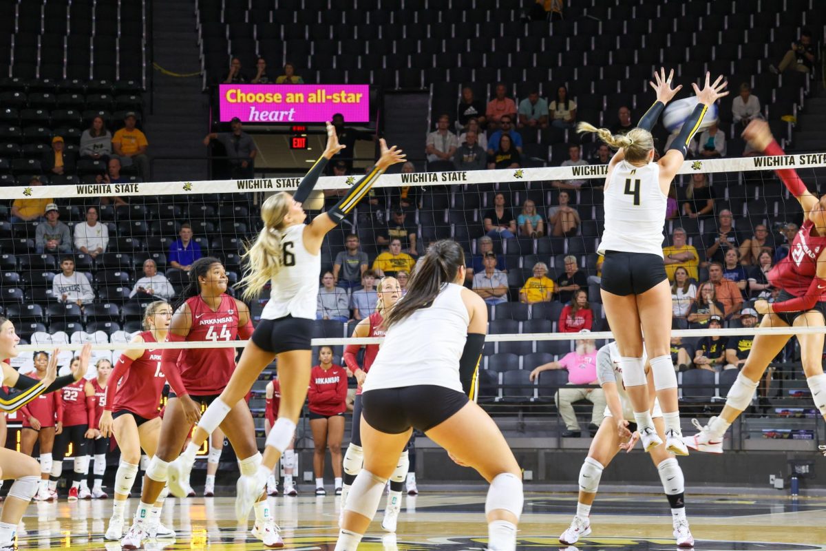 Senior outside hitter Brooklyn Leggett puts her hands up to block a shot on Aug. 31. Leggett blocked three shots against Arkansas.