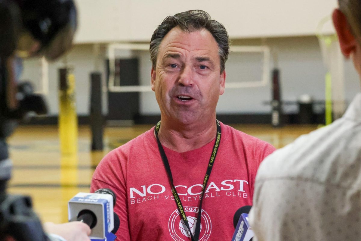 WSU volleyball head coach Chris Lamb speaks to reporters after the team's first practice on Aug. 4. Lamb is entering his 26th year as the Shockers' head coach.