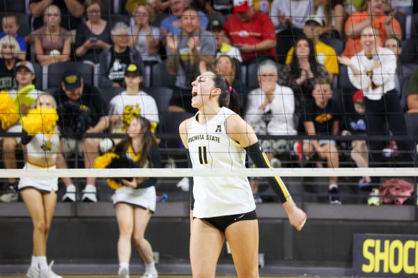 Junior outside hitter Sydney Dunning screams after getting a kill against Arkansas. Dunning had a game-high 20 kills on Aug. 31.