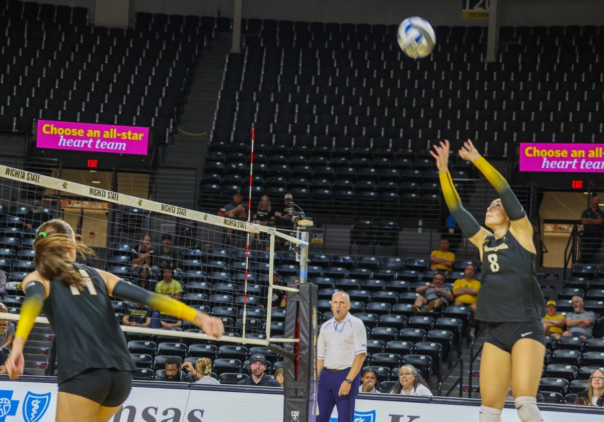 Juniors Hannah Hawkins and Maddie Wilson set up a play on Aug. 29 against Kennesaw State. Hawkins made 10 assists and Wilson made four kills in the loss.