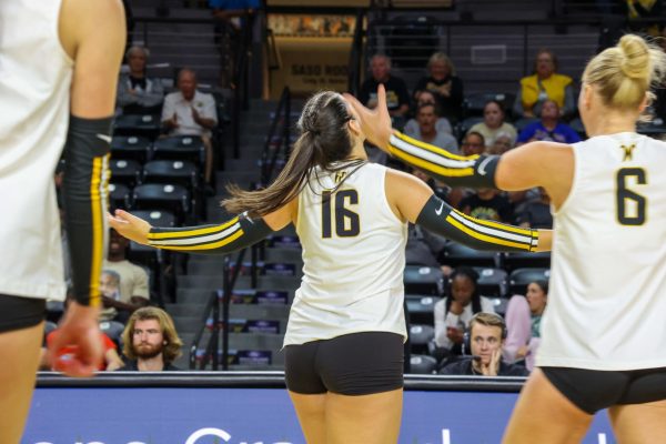 Junior setter Jordan Heatherly celebrates after getting a kill on Aug. 31. Heatherly had three kills and 49 assists against Arkansas.