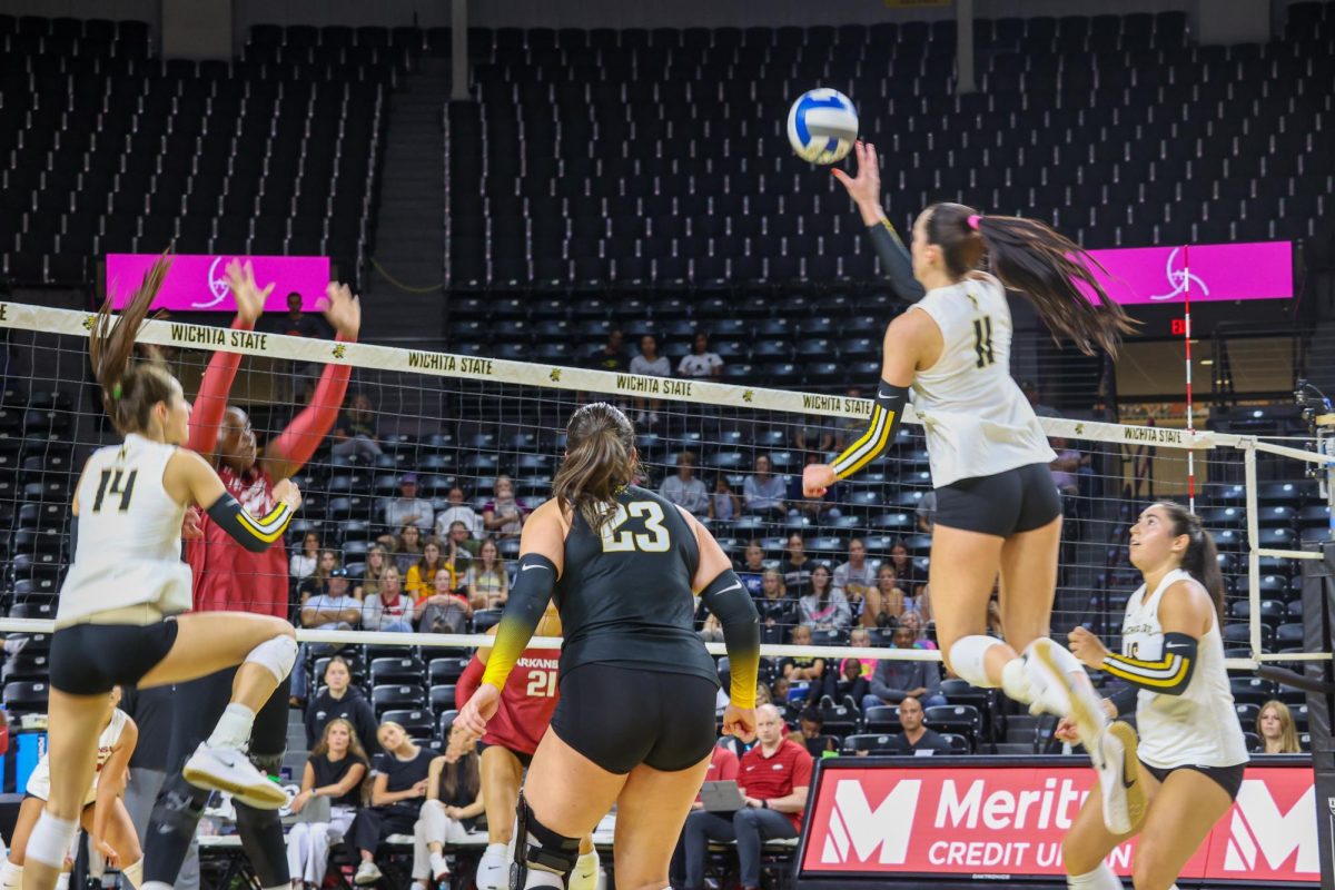 Junior outside hitter Sydney Dunning goes to push the ball over the net against Arkansas. Dunning made a game-high 20 kills in the win on Aug. 31.