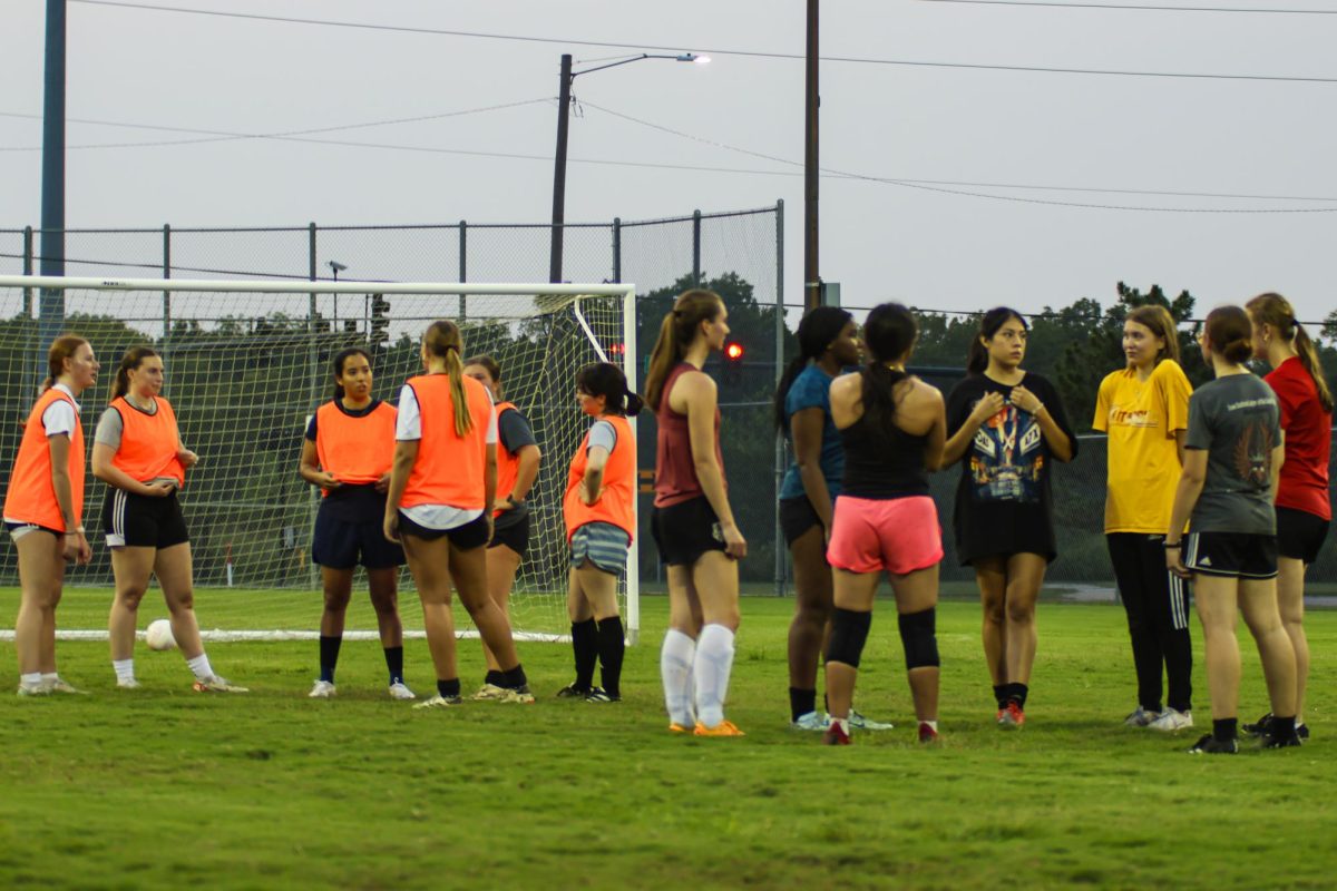 Members of Wichita State's women's soccer club prepare to scrimmage on Sept. 4. Practices are held on field three at the Metroplex.