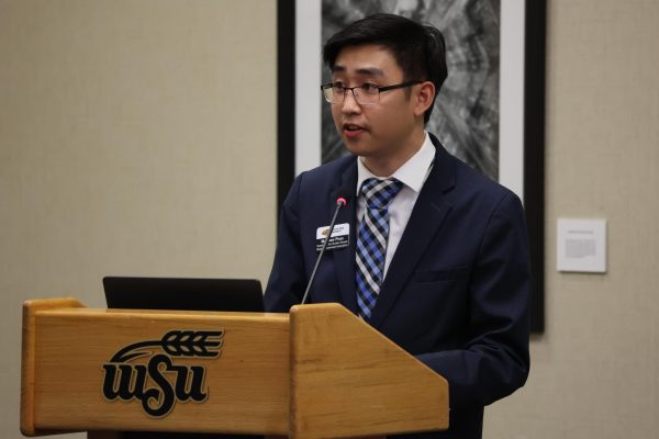 Speaker of the Senate Matthew Phan addresses the Student Government Association Senate at their weekly meeting.