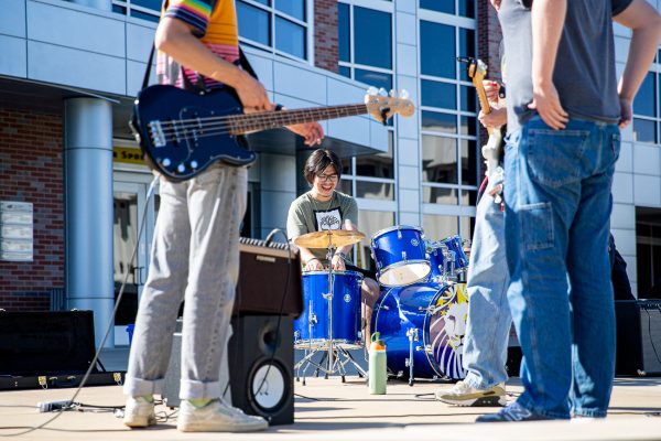 Freshman Tobias Jacquet plays the drums with Entrails on the RSC East Patio. The event was free and open for all students to attend.